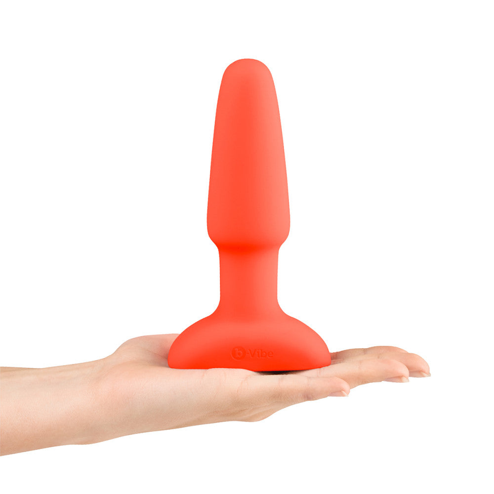 B-Vibe Rimming Plug 2 - Orange on white background. Available at SugarX in Sex Toys in the Butt Plug collection.