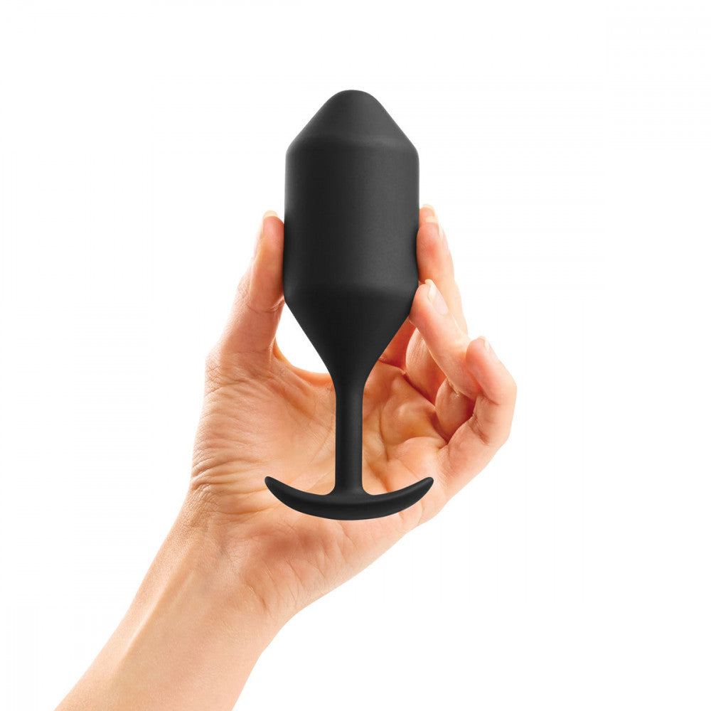 B-Vibe Snug Plug 4 - Black on white background. Available at SugarX in Sex Toys in the Butt Plug collection.