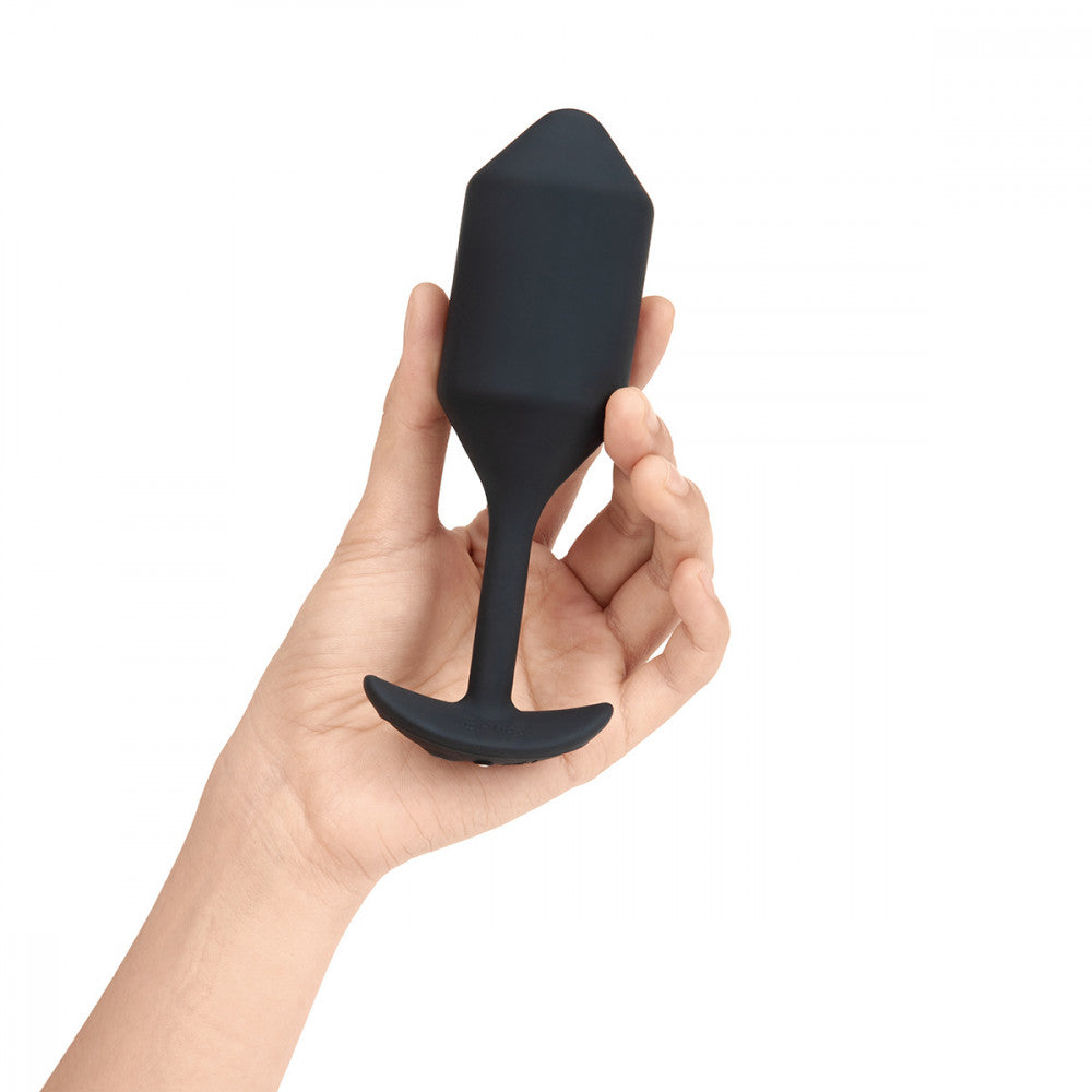 B-Vibe Vibrating Snug Plug 4 - Black on white background. Available at SugarX in Sex Toys in the Butt Plug collection.
