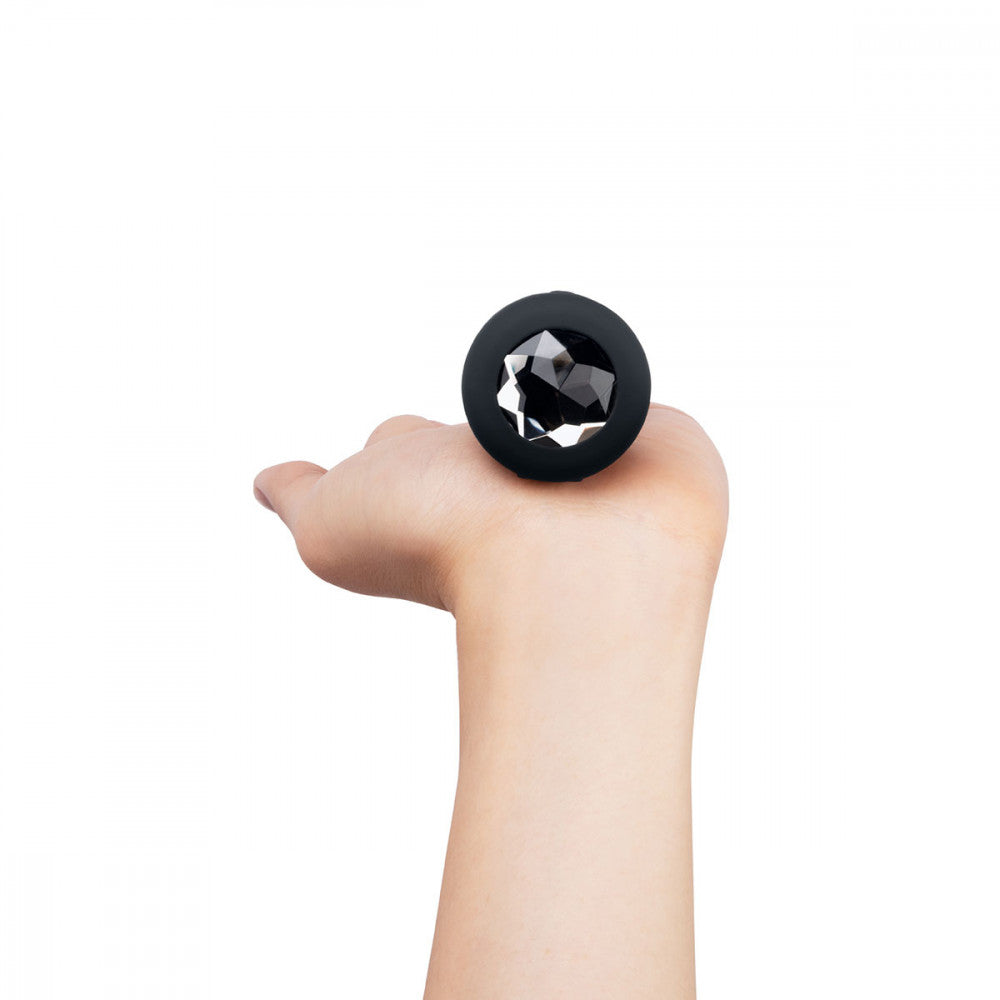 B-Vibe Vibrating Jewel Plug Medium/Large - Black on white background. Available at SugarX in Sex Toys in the Butt Plug collection.
