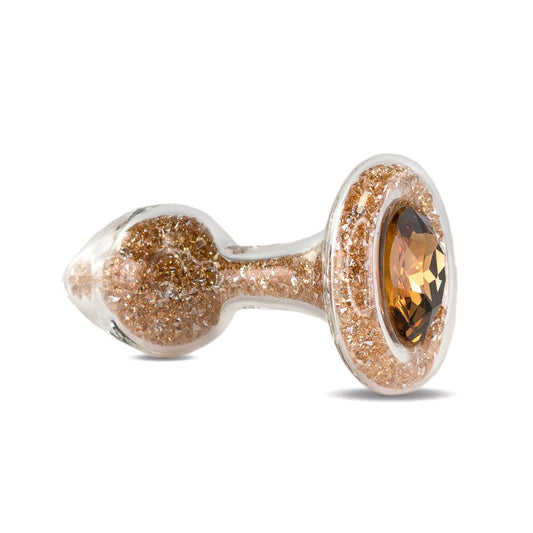 Sparkle Glass Butt Plug with Crystal Base in Gold viewed on a plain white background showcasing its crystal filled design. Available at SugarX in the Butt Plug section of the Sex Toys collection.