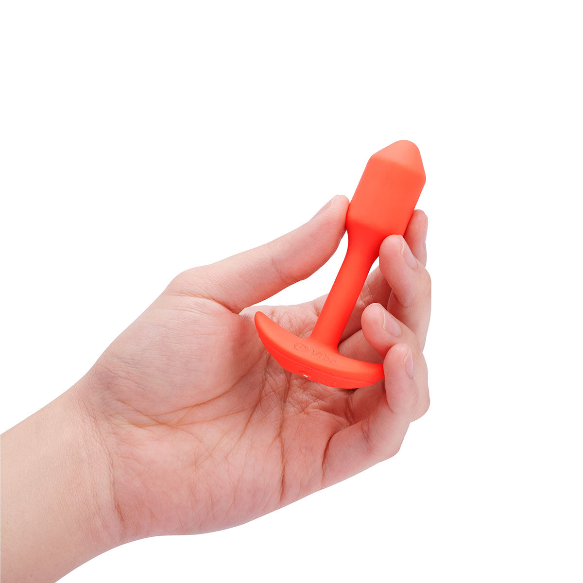 B-Vibe Vibrating Snug Plug 1 - Orange on white background. Available at SugarX in Sex Toys in the Butt Plug collection.