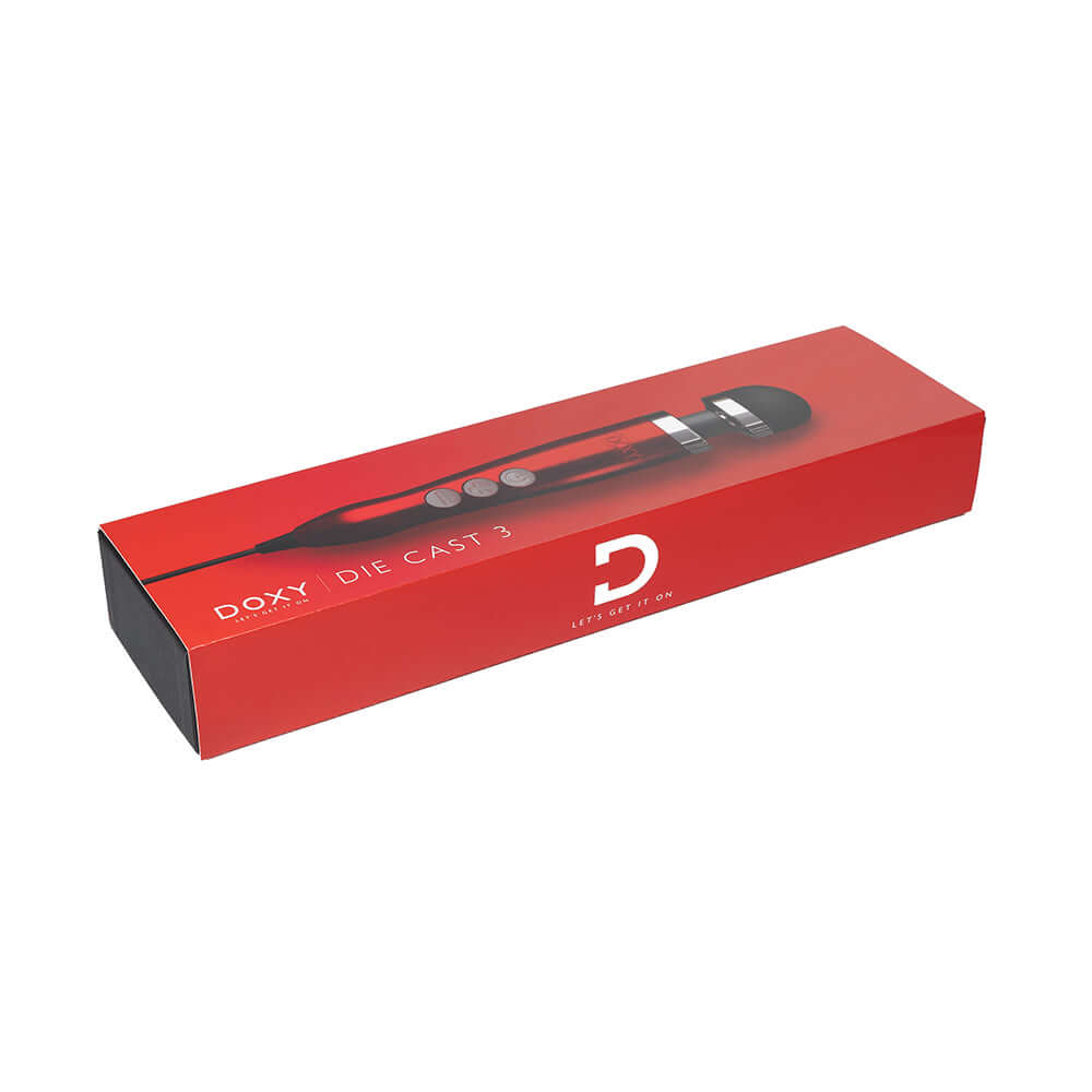 Doxy Die Cast 3 wand vibrator’s red storage box on its side on a plain white background, available at SugarX in Vibrators in the Sex Toy Collection.