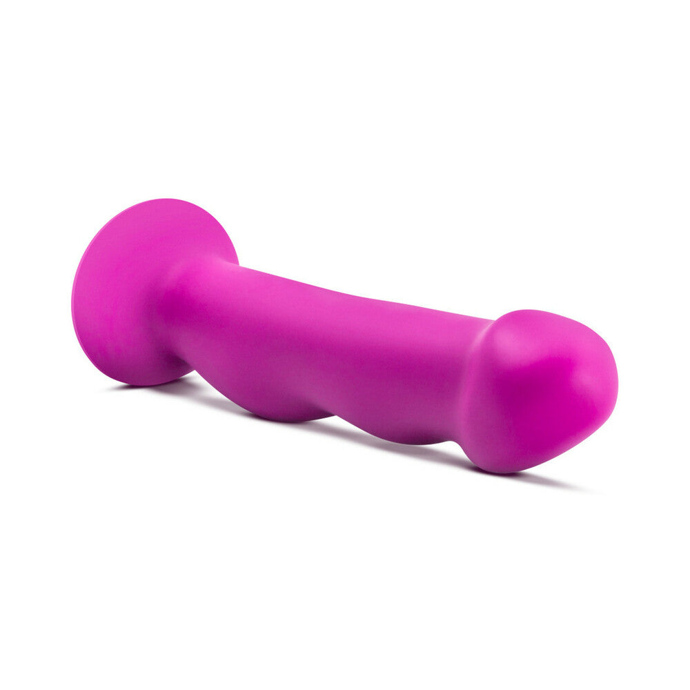 Side view of vant Suko D11 silicone suction cup dildo by Blush– curved G-spot sex toy at SugarX.