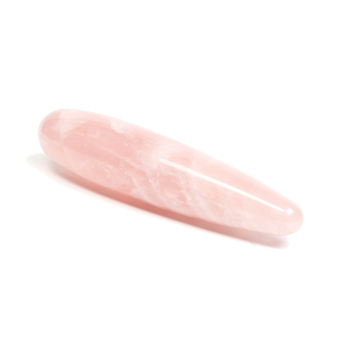 Rose quartz crystal dildo, The Heart Original by Chakrubs from SugarX on white background.