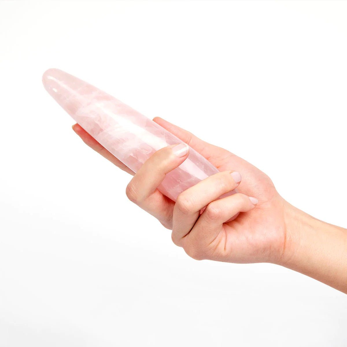 Close-up of Chakrub's The Heart Original rose quartz crystal dildo from SugarX.