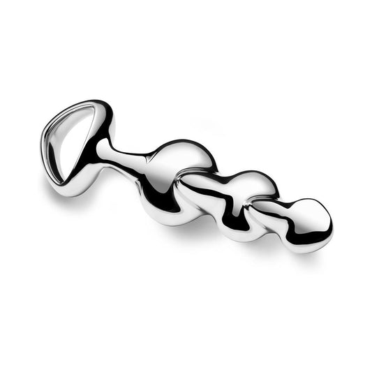 Njoy Disco stainless steel butt plug standing upright – luxury metal sex toy available at SugarX.