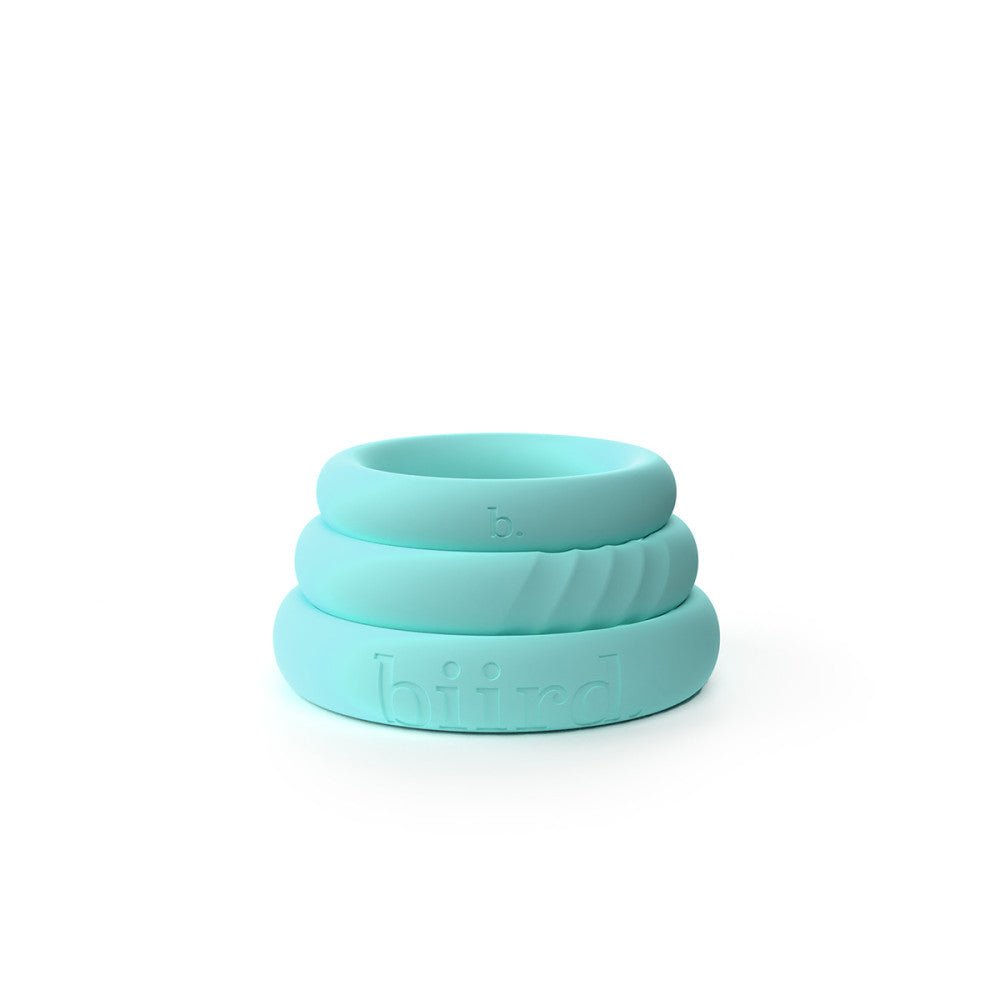 Biird Riin 3-Piece C-ring Set in Mint at SugarX in Sex Toys in the Cock Ring collection. The silicone cock ring set stacked on a white background includes three stretchy, smooth rings in different sizes, designed for comfort and enhanced pleasure.