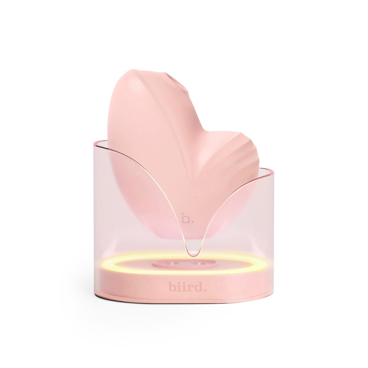 Biird Namii 2-in-1 clitoral vibrator in Peach at SugarX in Sex Toys in Clitoral Vibrators collection, shown on a plain white background. Made from ultra-soft silicone.