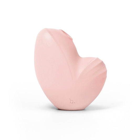 Biird Namii 2-in-1 clitoral vibrator in Peach at SugarX in Sex Toys in Clitoral Vibrators collection, shown on a plain white background. Made from ultra-soft silicone.