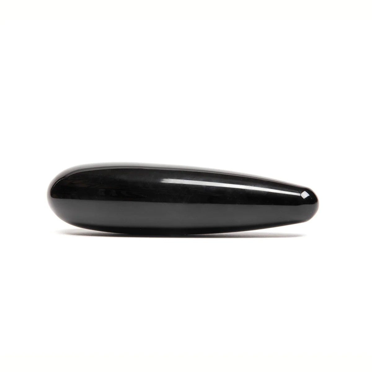 The Xaga Original by Chakrubs, a non-phallic obsidian dildo laying horizontally on a white background. Available at SugarX in Sex Toys in the Dildo collection.