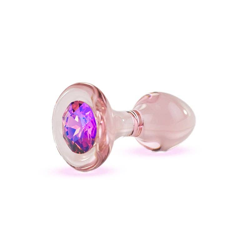 Colors Against Cancer Glass Pink Butt Plug viewed on a plain white background showcasing its design. Available at SugarX in the Butt Plug section of the Sex Toys collection.