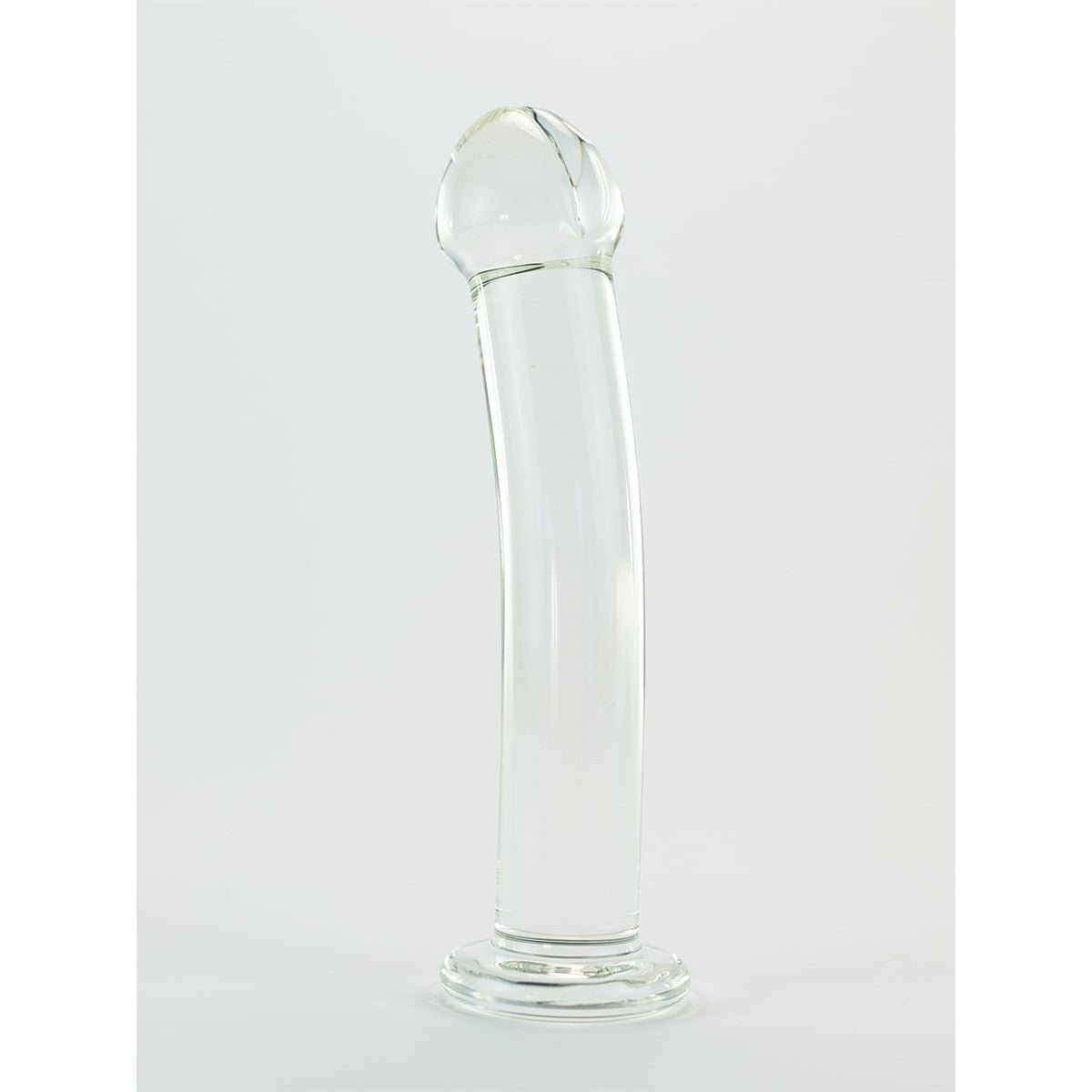 Crystal Delights Harnessable Dil views from another angle on a plain white background showcasing its curved harness friendly design meant to be used either vaginally or anally. Available at SugarX in the Dildo section of the Sex Toys collection.