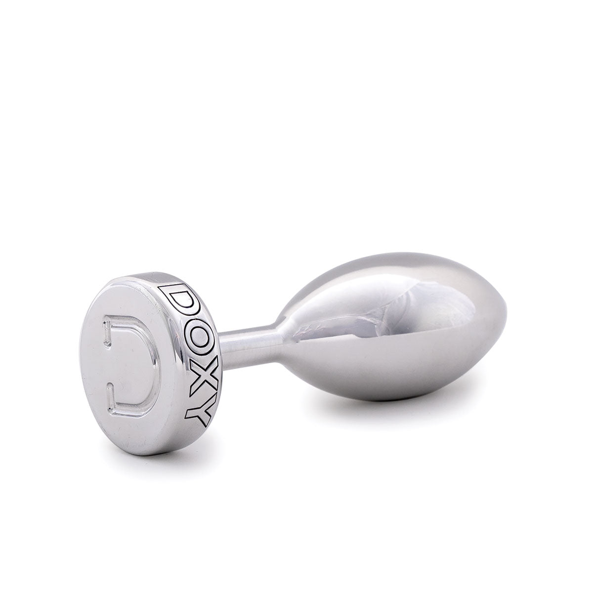 Doxy Smooth Metal Butt Plug standing lying on its side on a plain white background showcasing its tapered aluminum body and extra long stem. Available at SugarX in the Butt Plug section of the Sex Toys collection.
