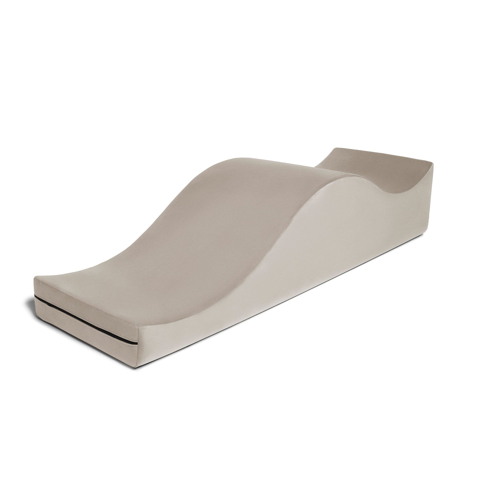 Single piece of the Liberator Equus Wave sex chaise lounge in buckwheat, with a curvy side up for optimal comfort during play - SugarX.