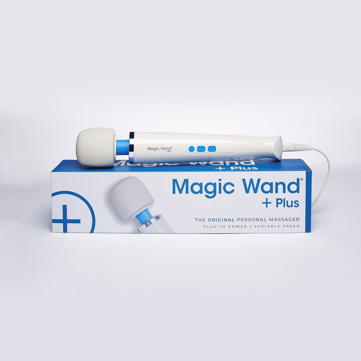 Magic Wand Plus vibrating wand sex toy lying on it's box on a plain white background. Available at SugarX in the Vibrating Wand section of the Sex Toy collection.