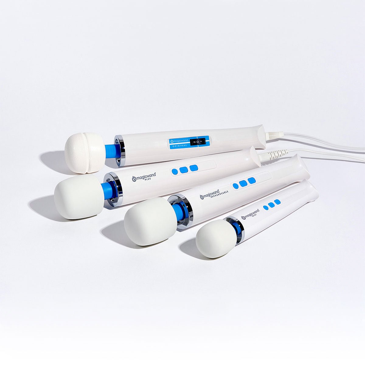 The Magic Wand Micro, Magic Wand Mini, Magic Wand Original, Magic Wand Plus and Magic Wand Rechargable vibrating wand sex toys lying next to each other on a white background. Available at SugarX in the Wand Vibrator section of the Sex Toy Collection.