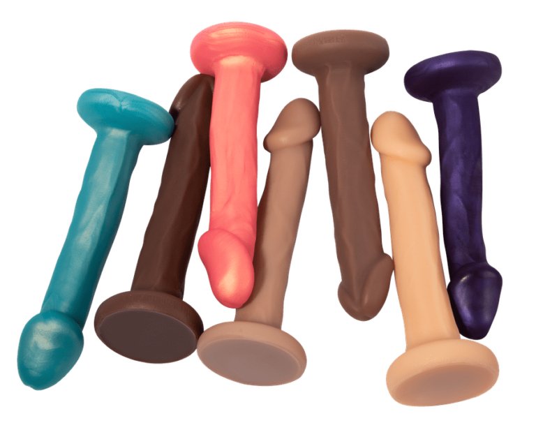 Mason Posable Realistic Silicone Harness Compatible Dildo by New York Toy Collective in multiple colors on a white background. Available at SugarX in Sex Toys in the Dildo collection.