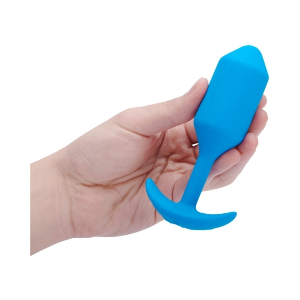 B-Vibe Vibrating Snug Plug 5 - Blue on white background. Available at SugarX in Sex Toys in the Butt Plug collection.