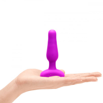 B-Vibe Novice Plug - Fuchsia on white background. Available at SugarX in Sex Toys in the Butt Plug collection.