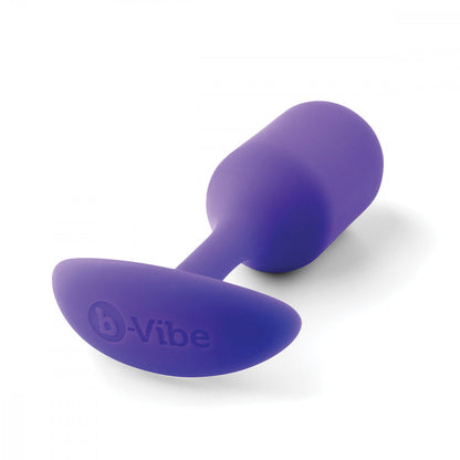 B-Vibe Snug Plug 2 - Purple on white background. Available at SugarX in Sex Toys in the Butt Plug collection.