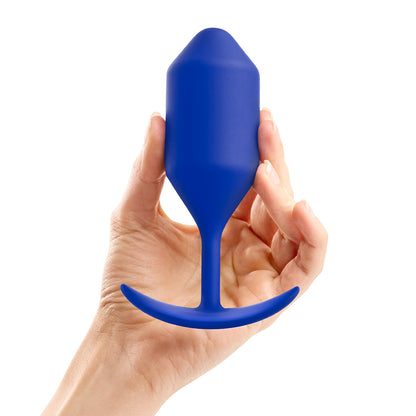 B-Vibe Snug Plug 4 - Navy Blue on white background. Available at SugarX in Sex Toys in the Butt Plug collection.