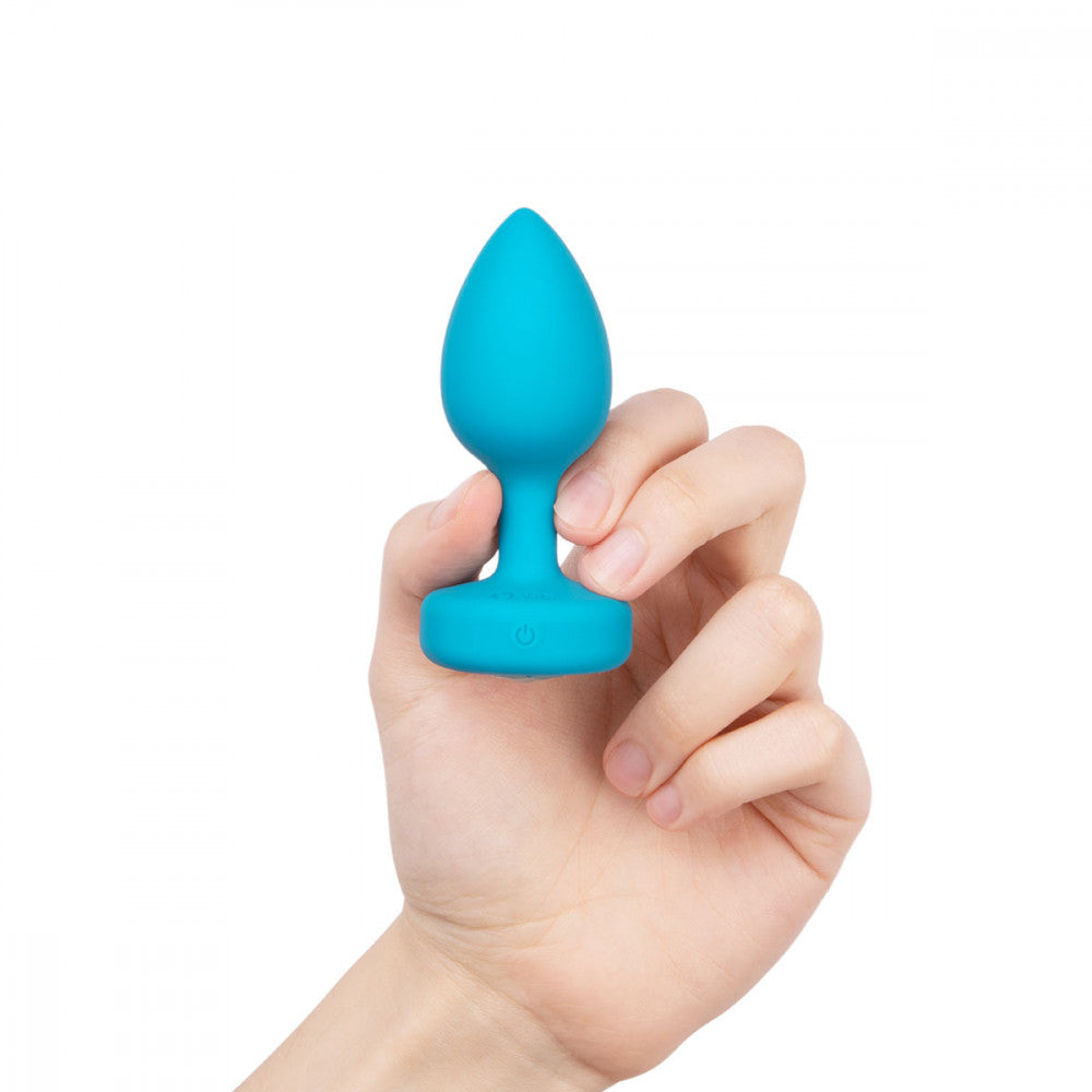 B-Vibe Vibrating Jewel Plug Small/Medium - Aqua on white background. Available at SugarX in Sex Toys in the Butt Plug collection.