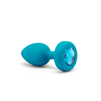 B-Vibe Vibrating Jewel Plug Small/Medium - Aqua on white background. Available at SugarX in Sex Toys in the Butt Plug collection.