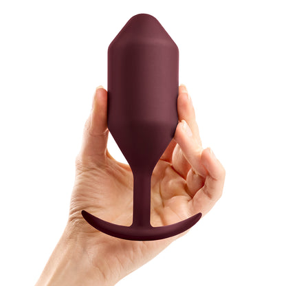 B-Vibe Snug Plug 5 - Dark Red on white background. Available at SugarX in Sex Toys in the Butt Plug collection.