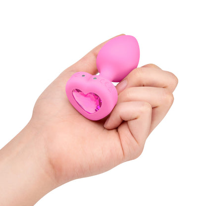 B-Vibe Vibrating Heart Plug Small/Medium - Pink Topaz on white background. Available at SugarX in Sex Toys in the Butt Plug collection.