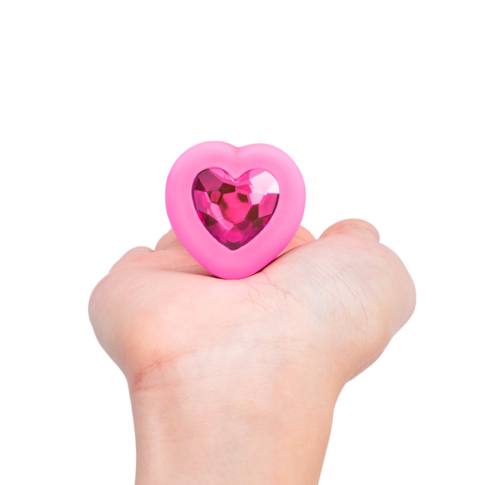 B-Vibe Vibrating Heart Plug Small/Medium - Pink Topaz on white background. Available at SugarX in Sex Toys in the Butt Plug collection.