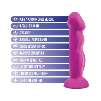 Blush Avant Suko D11 dildo next to feature graphics – dual-density silicone, curved for G-spot, harness compatible at SugarX.
