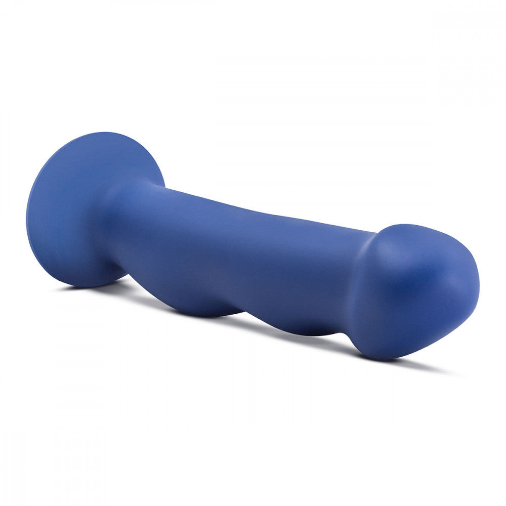 Side view of Blush Avant Suko D12 indigo dildo facing camera – curved G-spot dildo with suction base – SugarX.