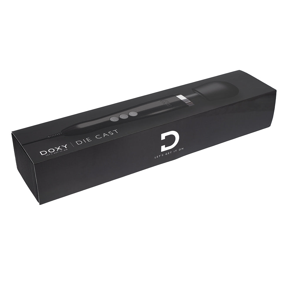 Doxy Die Cast Black wand vibrator lying flat on a plain white background, capturing its elegant and powerful structure. Available at SugarX in the Vibrators Collection. 