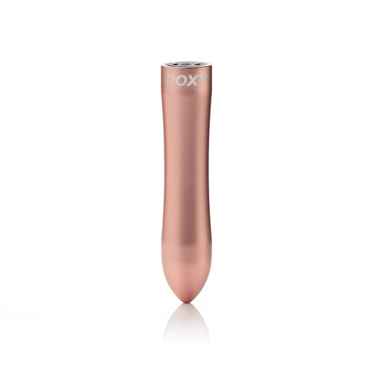 Doxy Bullet vibrator upright facing forward on a plain white background, showcasing its elegant rose gold design, perfect for discreet pleasure. Available at SugarX in the Vibrators Collection.