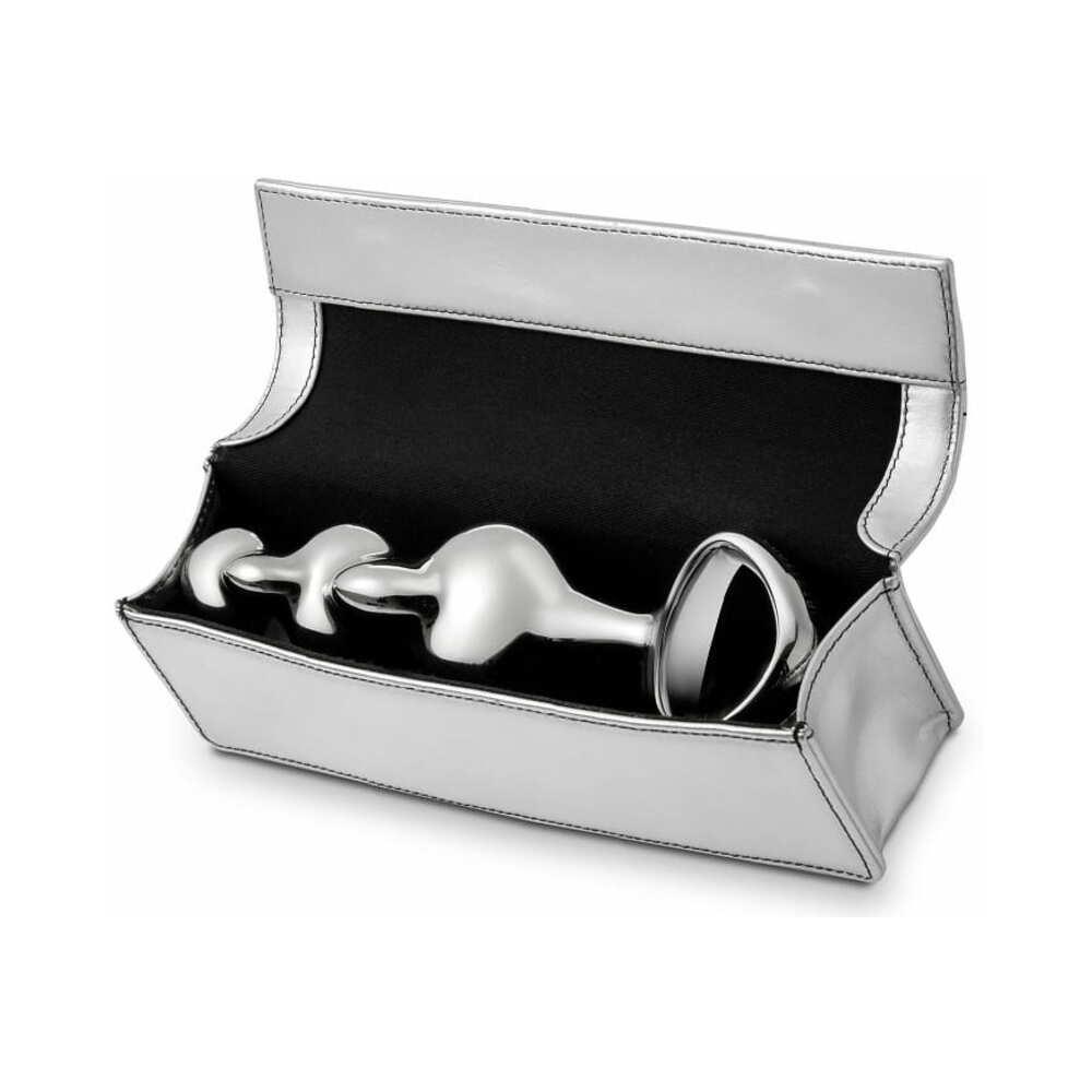 Close-up view of Njoy Disco’s stainless steel curves in its storage box – premium anal sex toy from SugarX.