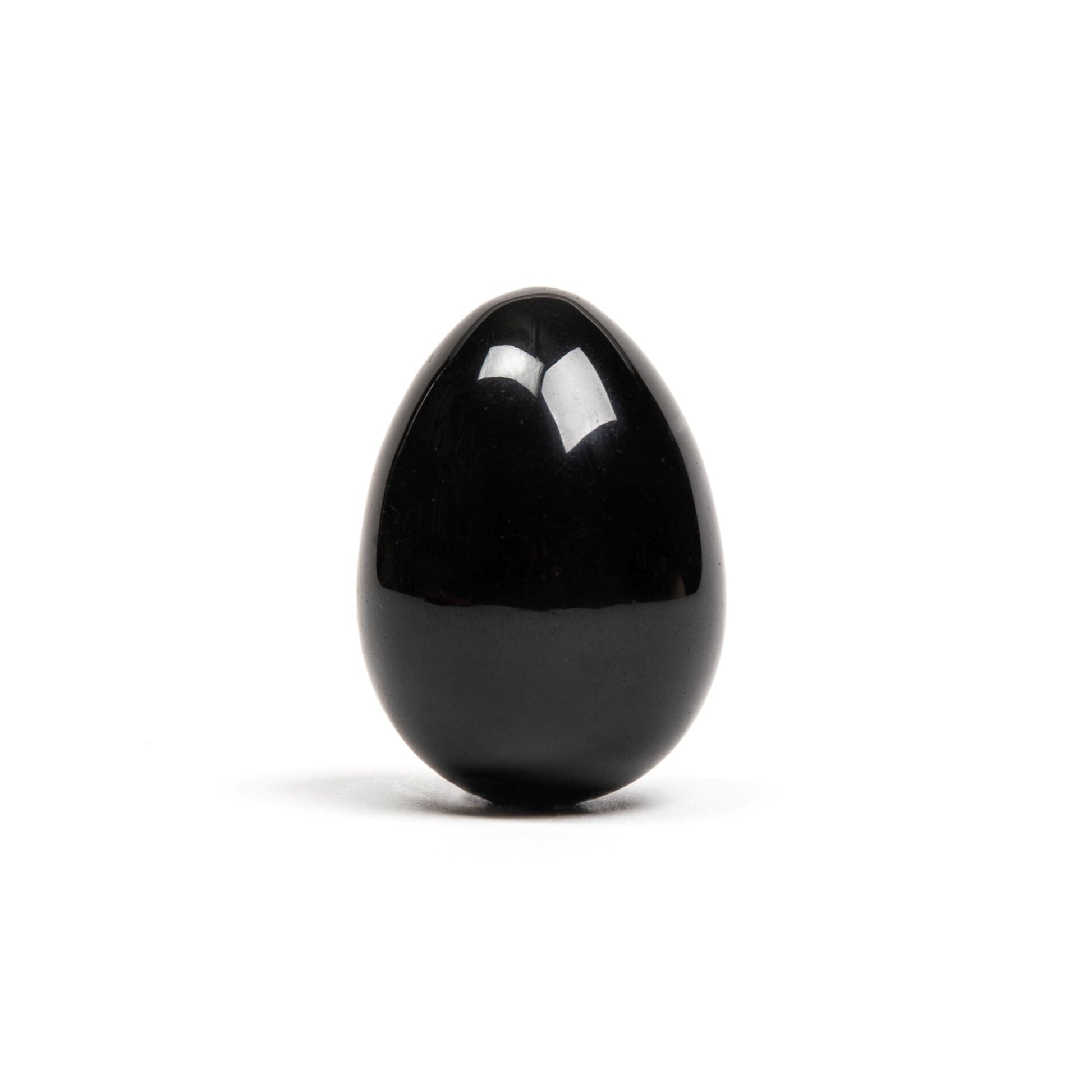 The Xaga Yoni Egg by Chakrubs, an obsidian crystal yoni egg on a white background. Available at SugarX in Sex Toys in the Kegel collection.