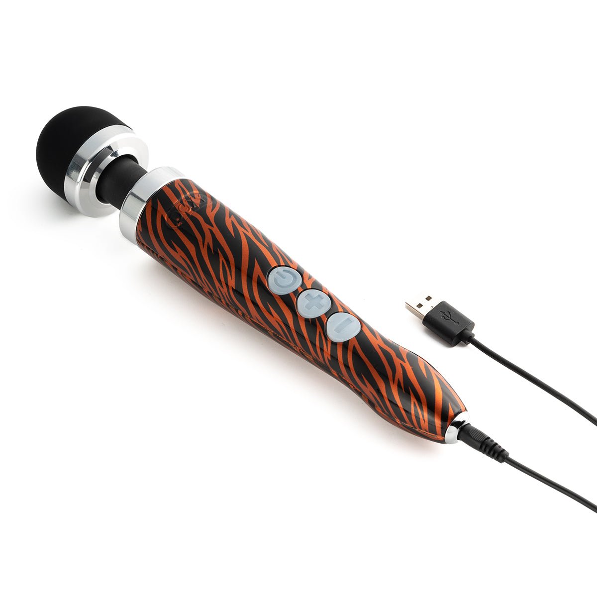 Tiger version of the Doxy Die Cast 3R wand vibrator lying on a white background alongside its charging cable. A versatile sex toy available at SugarX in the Vibrators Collection.