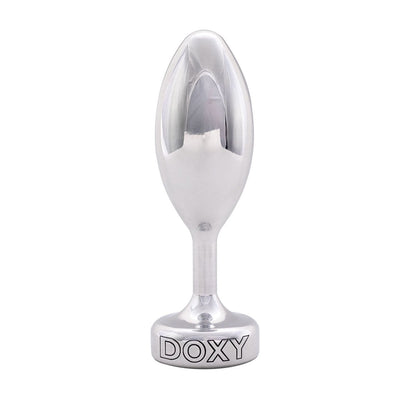 Doxy Smooth Metal Butt Plug standing upright on a plain white background showcasing its tapered aluminum body and extra long stem. Available at SugarX in the Butt Plug section of the Sex Toys collection. 