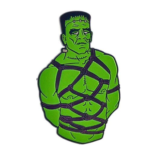 Geeky & Kinky Frankenstein Bound Pin displayed showcasing its design. Available at SugarX in Jewelry in the Pins collection.