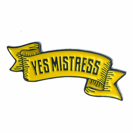 Geeky & Kinky Yes Mistress Pin displayed showcasing its design. Available at SugarX in Jewelry in the Pins collection.