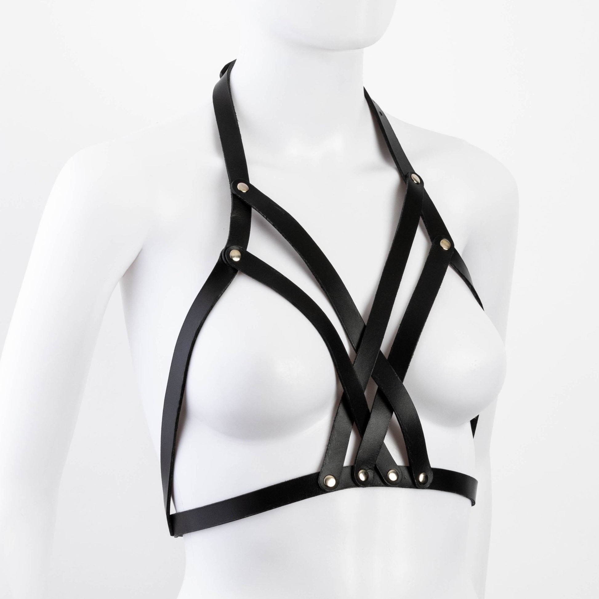 Diagonal angle of black Liberator Galway Harness on mannequin bust, highlighting the leather straps and craftsmanship from multiple angles at SugarX