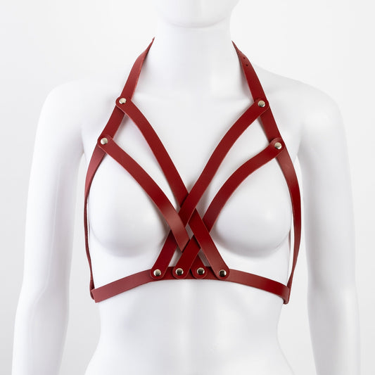 Front view of red leather Liberator Galway Harness on mannequin bust, showcasing striking red leather straps and nickel-plated accents at SugarX.