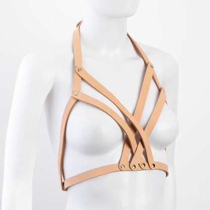 Diagonal angle of tan Liberator Galway Harness on mannequin bust, capturing the chest strap matrix and stylish craftsmanship at SugarX.