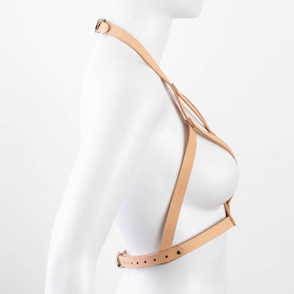 Side view of tan Liberator Galway Harness on mannequin, highlighting adjustable back buckle and smooth leather detailing at SugarX.