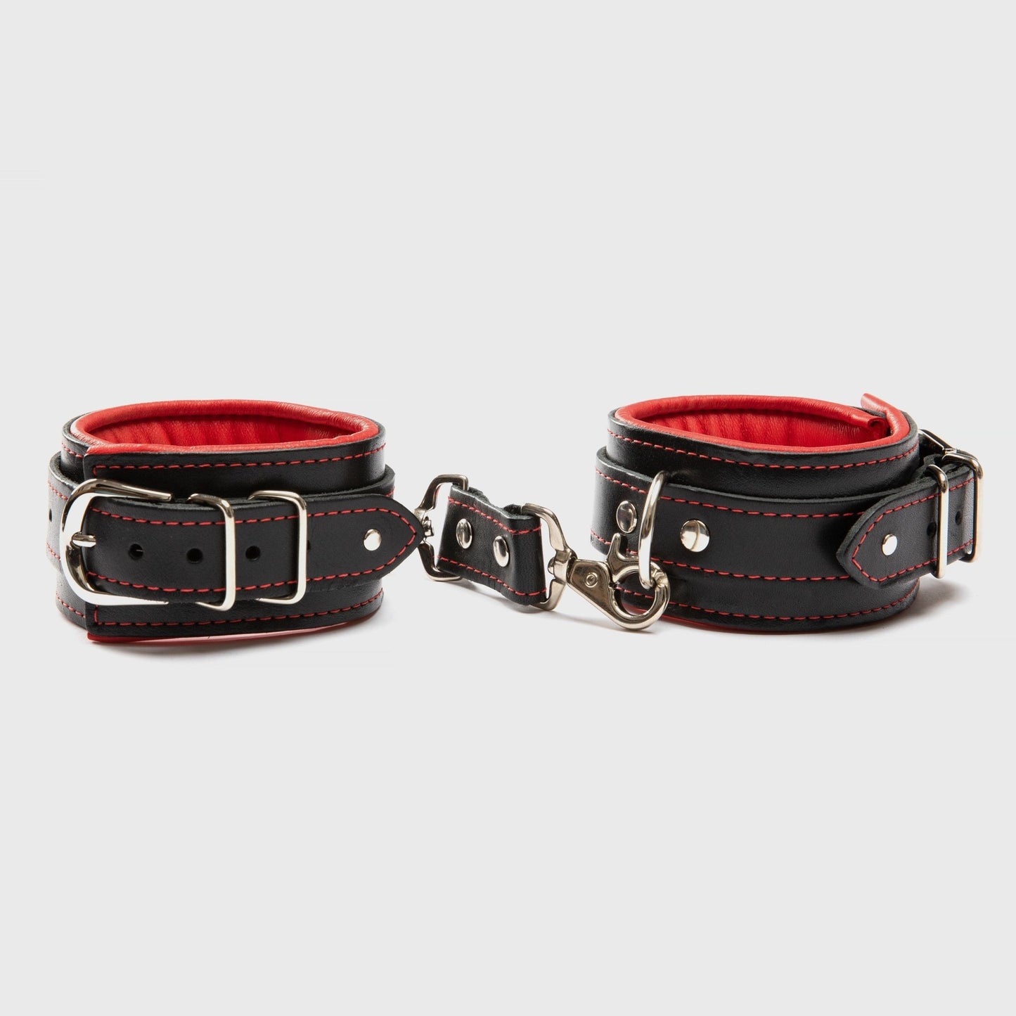 Mercer Padded Leather Ankle Cuffs in two-tone design, featuring luxurious padding and nickel-plated hardware, perfect for BDSM restraints and bondage play.