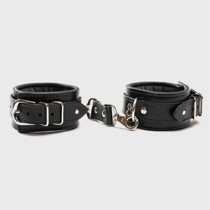 Mercer Padded Leather Ankle Cuffs in two-tone design, featuring luxurious padding and nickel-plated hardware, perfect for BDSM restraints and bondage play.