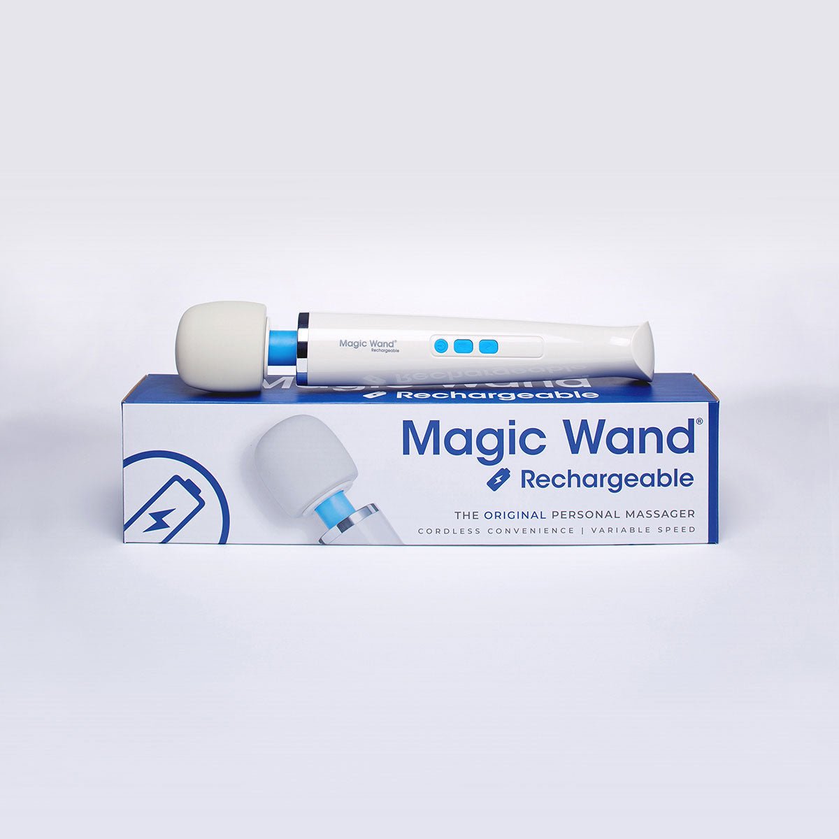 Magic Wand Rechargeable Vibrating Wand lying on its box on a plain white background. Available at SugarX in the Vibrating Wand section of the Sex Toy collection.